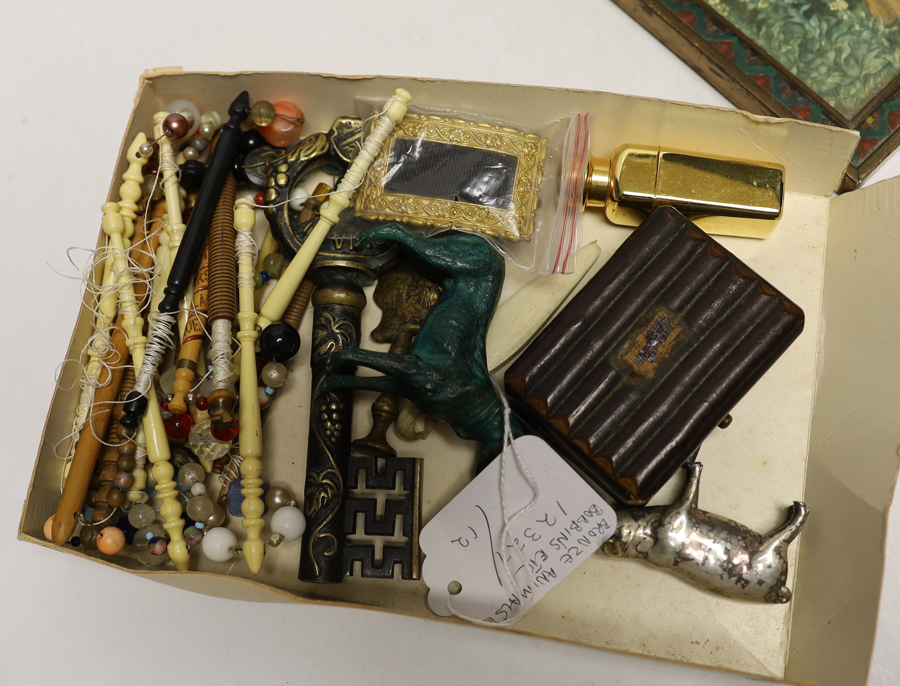 Miscellaneous collectables, bronze and metal animals, bobbins etc
